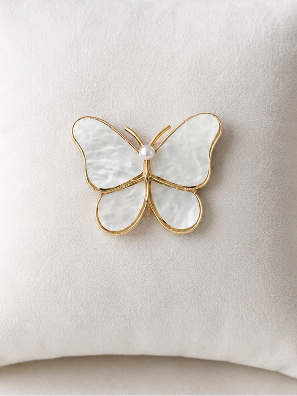Elegant White Mother-of-Pearl Butterfly Brooch with Gold Trim